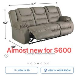 Almost New Reclining Sofa For Sale