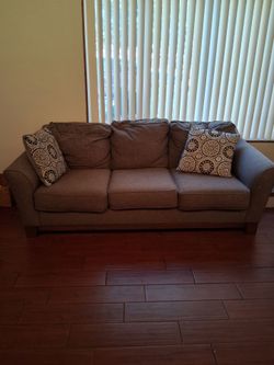 Gray couch. Like new. Smoke free