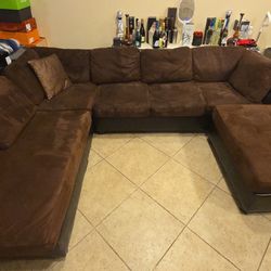 Chocolate Brown sectional with Ottoman