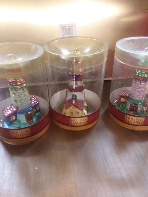 Glass lighthouse ornament trio