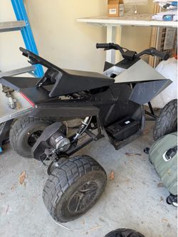Tesla Cyberquad shell / parts only — not rideable
