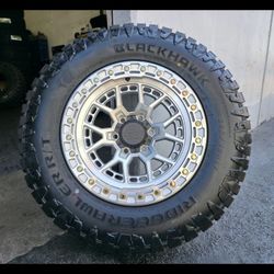 17" LOCK  rims w- 32" Tires 