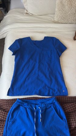 White cross Blue Scrubs