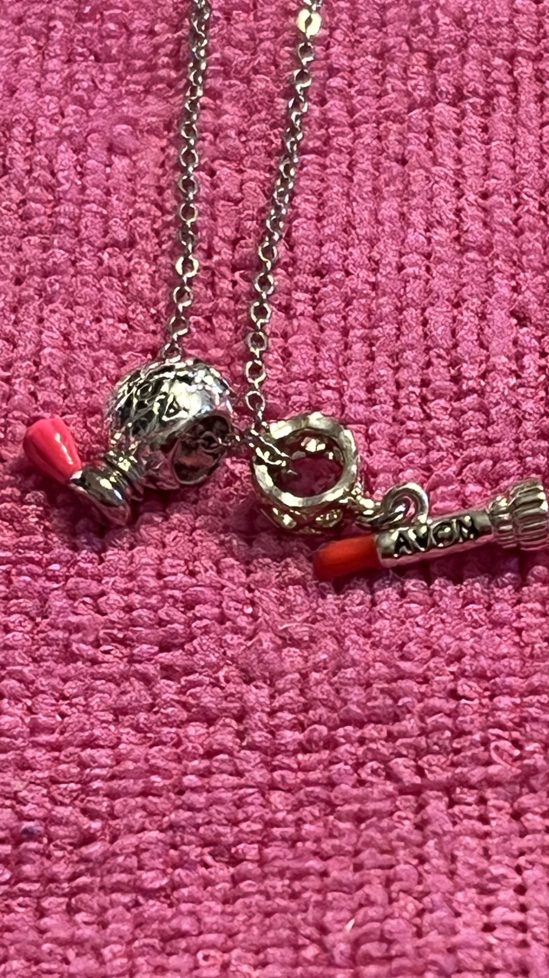 AVON Perfume And lipstick charm Necklace. New never been used 