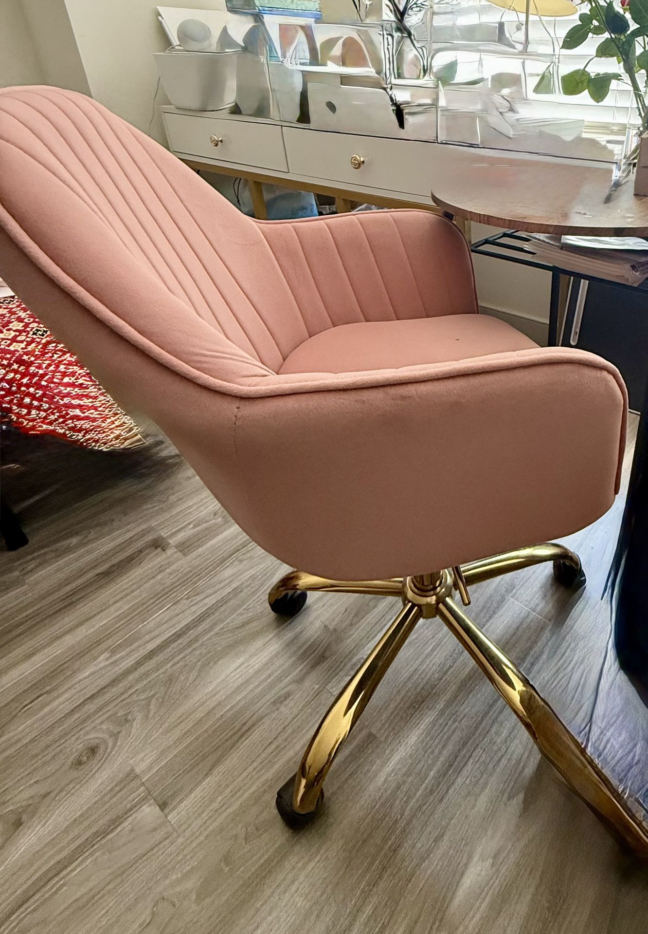 Pink blush chair with golden accent