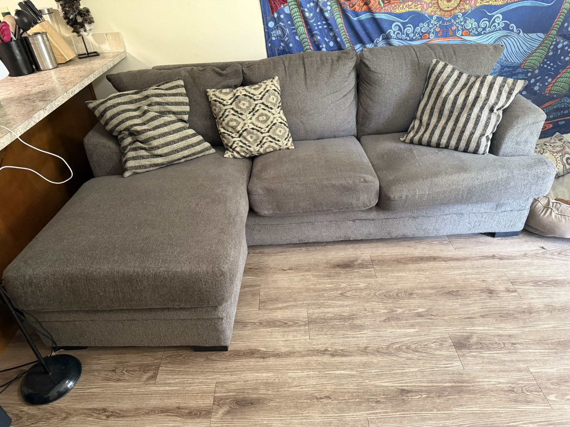 Sofa With Reversible Chaise And Pillows