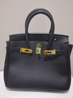 Hermes black bag original (no imitation).