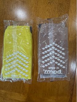2 Pairs of double-imprinted, terry socks in adult size. Slip resistant. NEW