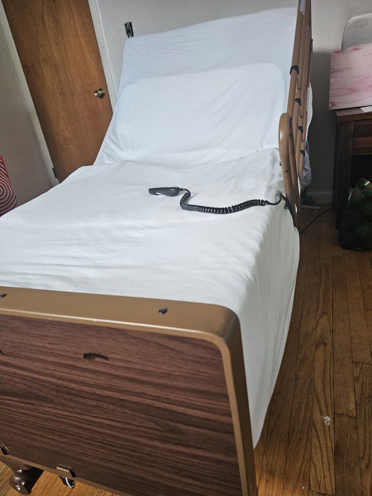 Adjustable Bed With Railings