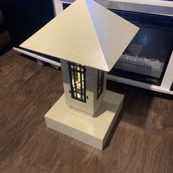 wooden pyramid decoration with light