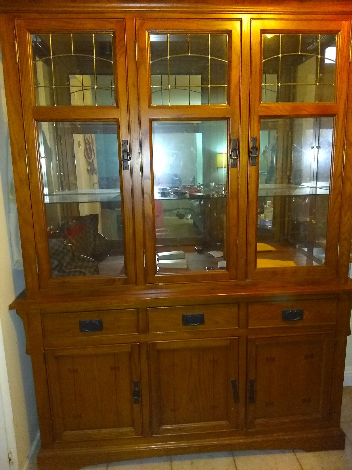 China Cabinet/Hutch, with glass shelves and lights. Lots of storage.