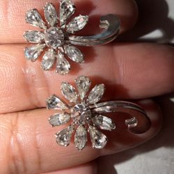 Vintage silver toned floral clip on earrings