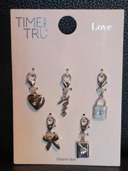 Silvertone Multi-Charm "Romance" Sets 
$3 each (Two Available)