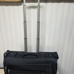 Samsonite rolling small garment bag 2 wheel used Once Excellent Condition Clean. One trip use in excellent condition with minimal signs of usage. 