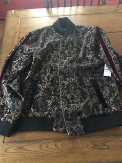 Inc gold and black jacket