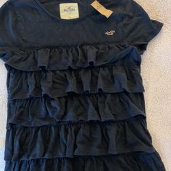 New lady small dark blue Hollister short sleeve with delicate ruffles in the front