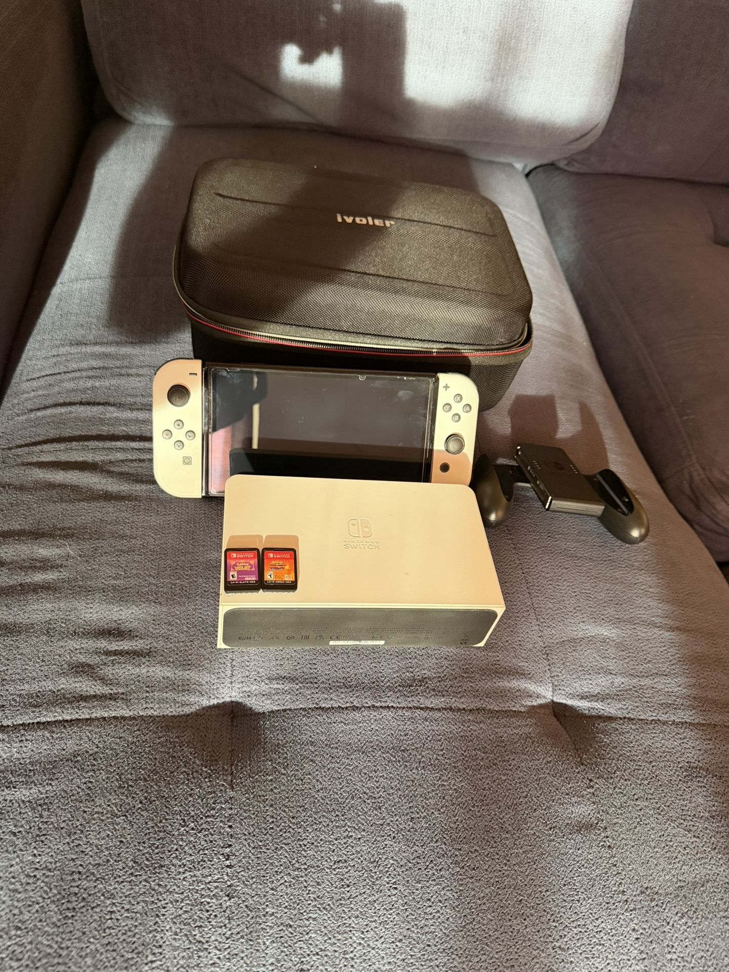 Nintendo Switch Oled With Pokemon And Mario Kart 8