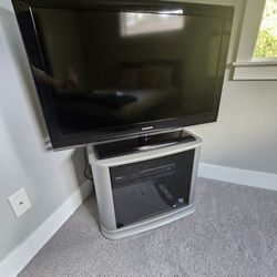 Samsung TV, Samsung DVD Player, & Swivel TV Stand
