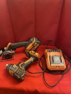 Lot 18V Ridgid Sub Compact Cordless Multi Material Saw. Drill. Charger And Battery