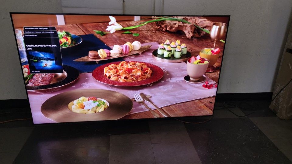 SAMSUNG 65"INCH QLED 4K Q90B!! There is a small spot on the screen.