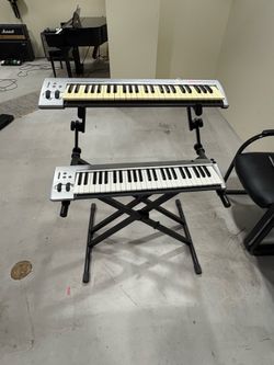 Double tier keyboard stand and keyboards