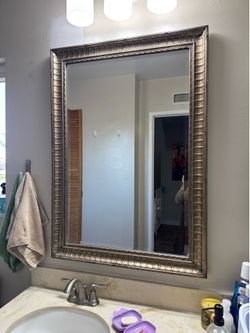 Warm silver framed mirror