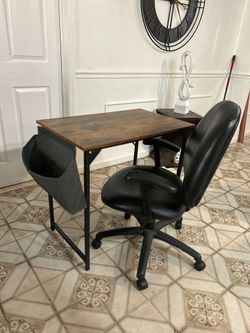 Computer desk with chair included.