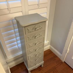nightstand and a jewelry/lingerie chest.
