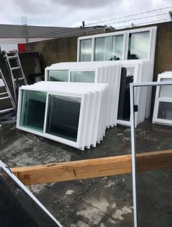 White Vinyl & Aluminum Sliding Windows – Lot