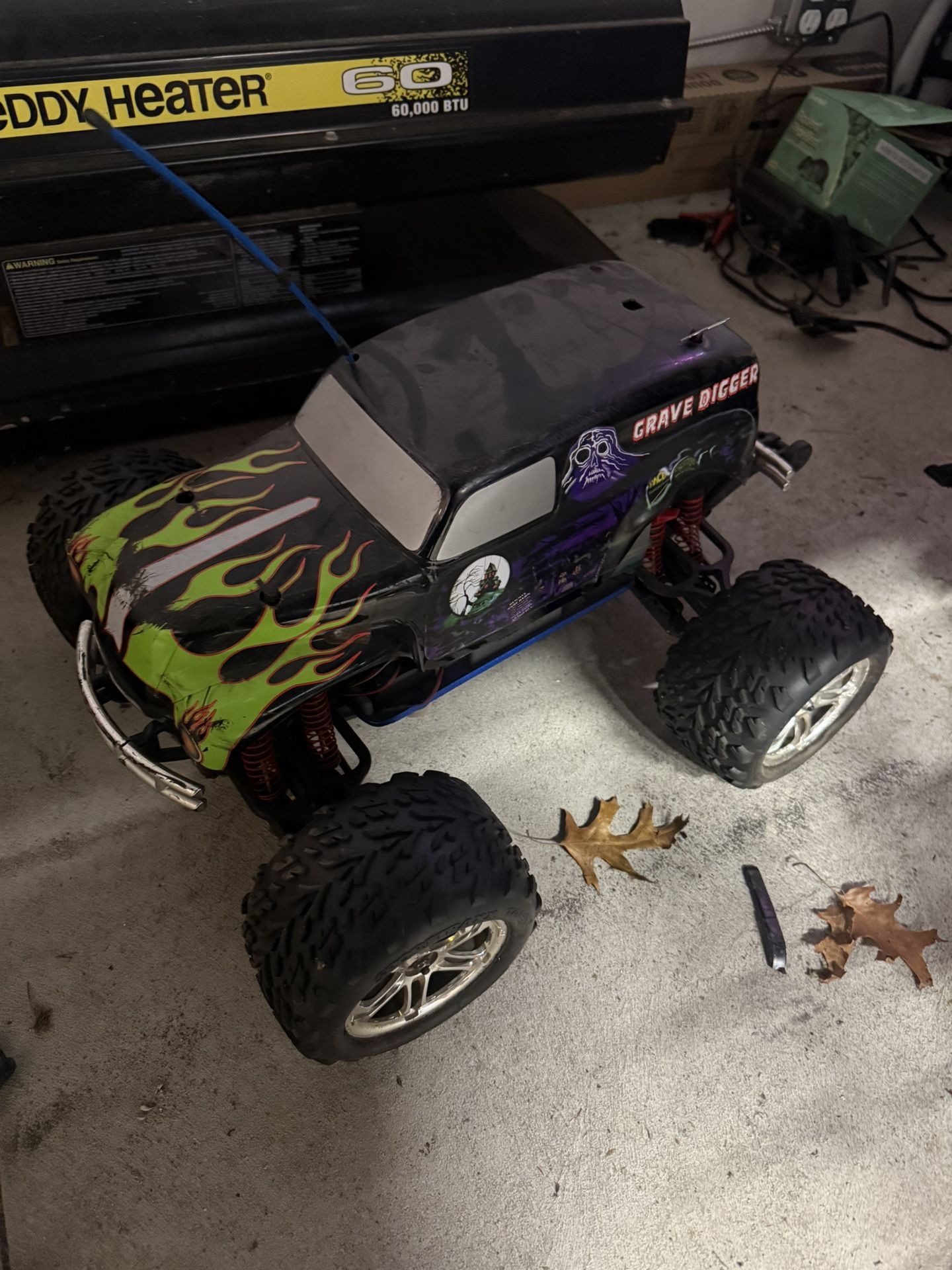 Traxxas Nitro Rc Car And A Bag Full Of Spare Parts