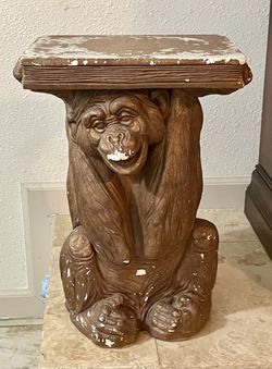 Bronze finish Marble Monkey holding a book end table weighing 40 pounds standing 20 inches tall and a 10x12 top