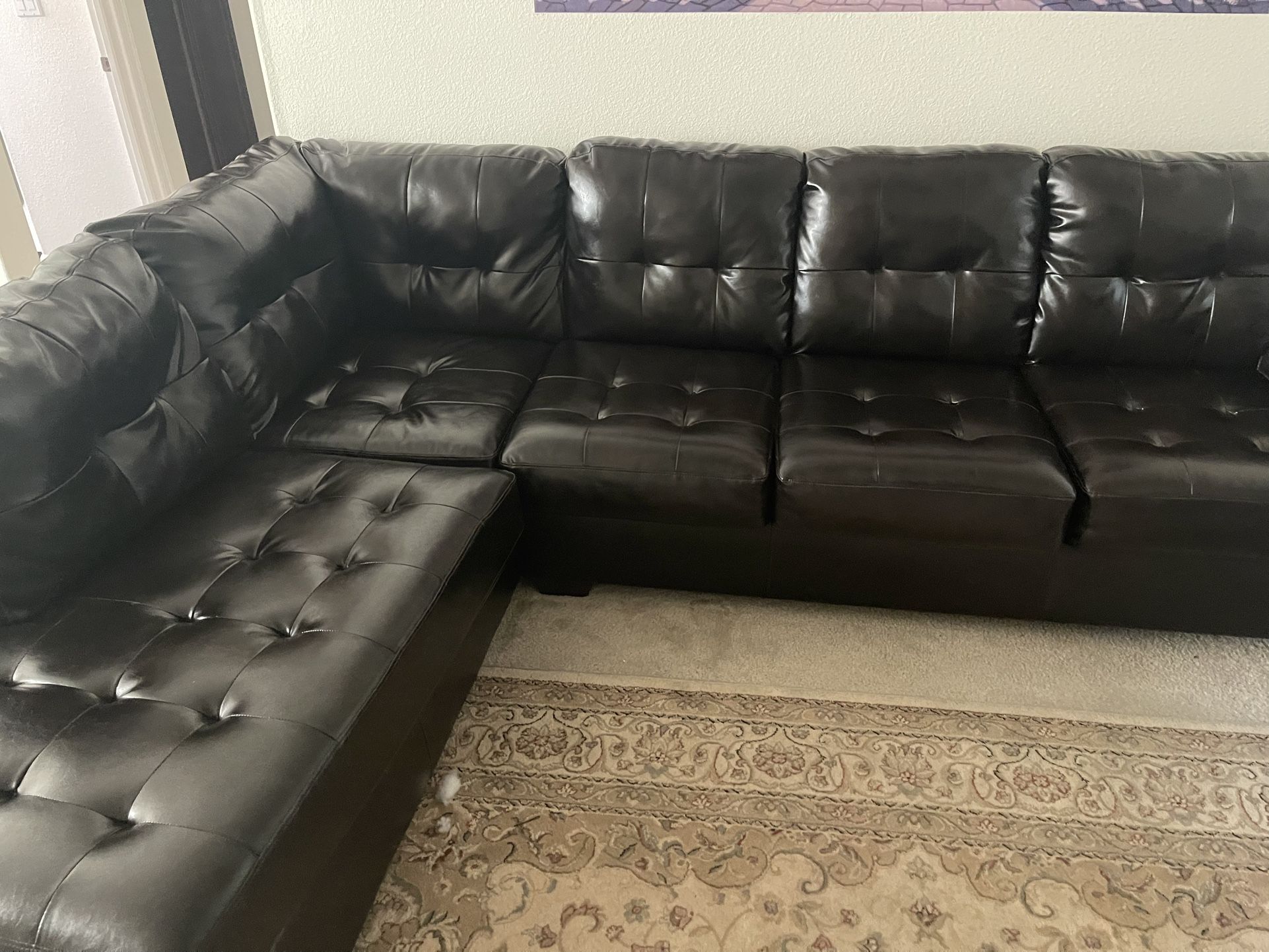 Contemporary Faux leather sectional couch Cost $1250 Originally 