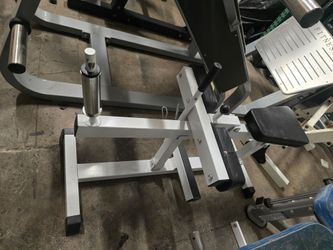 Seated calf gym equipment exercise weight plate loaded machine