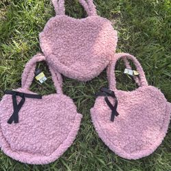 pink fuzzy heart-shaped bag