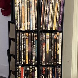 DVDs , Storage Shelf And CDs For Sale