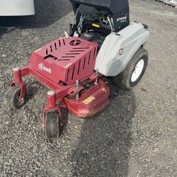 Exmark Staris S-Series 36” Stand-On Mower – 500 Hours – Grass Catcher Included