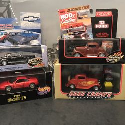 1:43 Scale Diecast Cars with Display Cases. New Unopened.