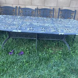 Cast Iron Table And 4 Chairs 