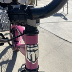 Girls Mongoose Rebel, beautiful pink bike with custom seat.