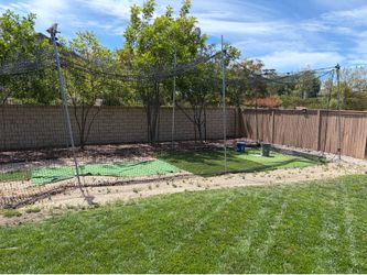 Pitching machine & batting cage