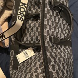 Mk duffle bag price new arrivals