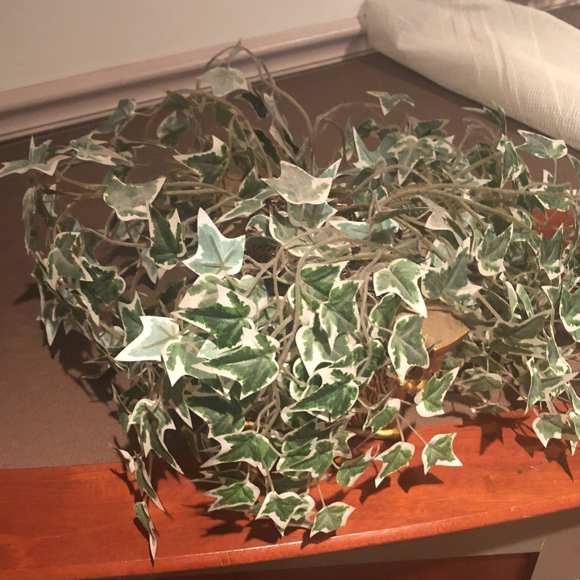 Flower Arrangement In Brass Look Pot