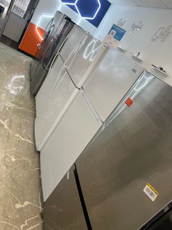 White nice working refrigerator