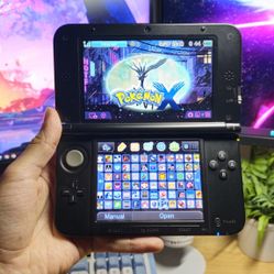 Nintendo 3DS XL Red/Black with 128GB games and charger