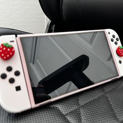 Nintendo Switch - OLED Model with White Joy-Con