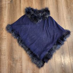 New Bagatelle Collection navy blue poncho features a luxurious faux fur trim around the collar and edges. new with tag
