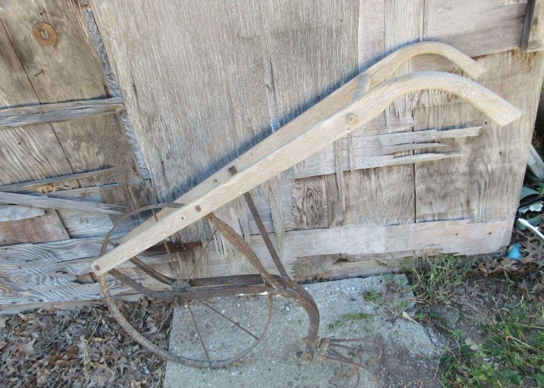 Garden Plow With Cultivator Attachment