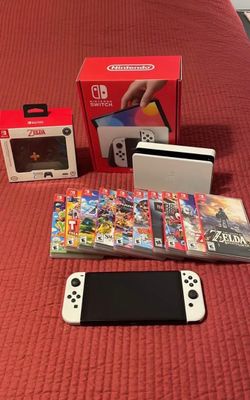 🚨 PERFECTLY CONDITION OLED WITH GAMES AND CONTROLLER PLUS CASE🚨