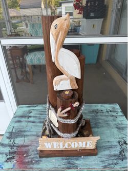 Hand designed nautical pillars welcome