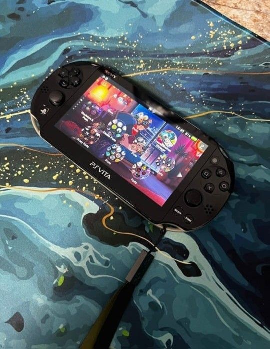 PS Vi Ta OLED 2000